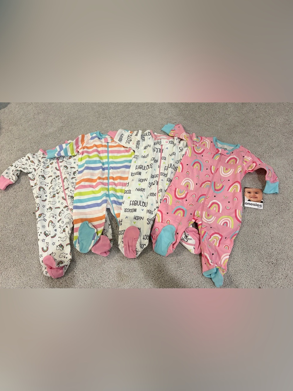 Onesies® Pink Rainbow Print Footed One-Piece for Kids